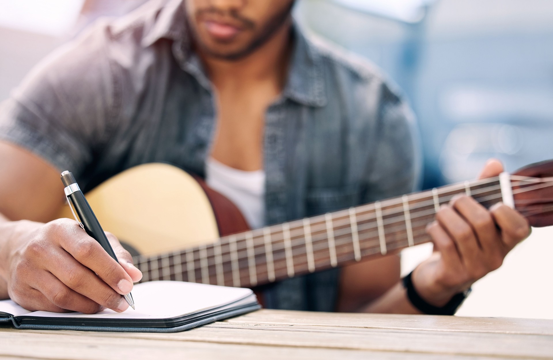 Cropped shot of an unrecognizable man playing guitar